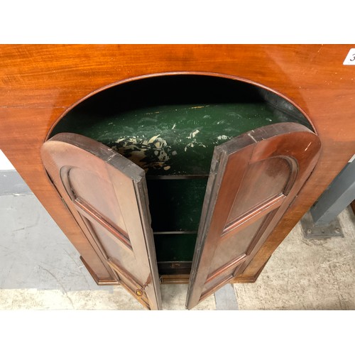 300 - GEORGIAN MAHOGANY DOMED PANELLED DOOR CORNER CUPBOARD WITH FITTED SPICE DRAWERS AND SHELVES TO INTER... 