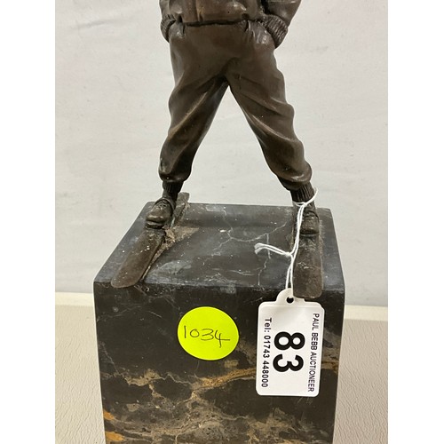 83 - REPRODUCTION BRONZE AND RESIN SKING BOY FIGURE ON MARBLE BASE H12