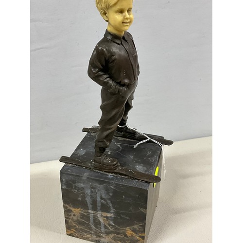 83 - REPRODUCTION BRONZE AND RESIN SKING BOY FIGURE ON MARBLE BASE H12