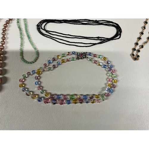 101A - 4 SMALL BOXES OF COSTUME JEWELLERY