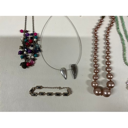 101A - 4 SMALL BOXES OF COSTUME JEWELLERY