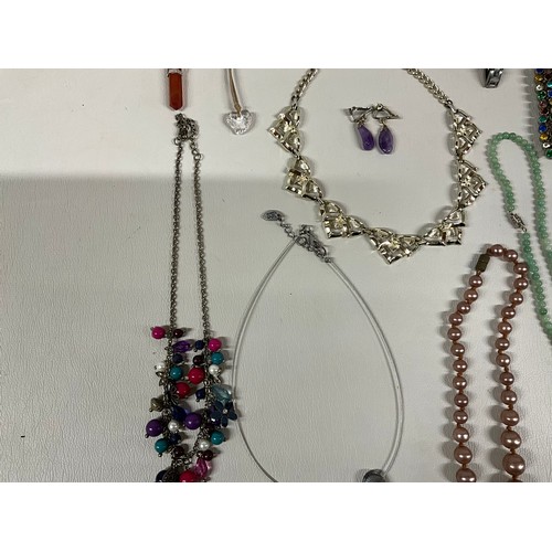 101A - 4 SMALL BOXES OF COSTUME JEWELLERY