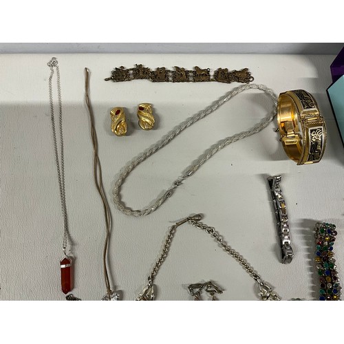 101A - 4 SMALL BOXES OF COSTUME JEWELLERY