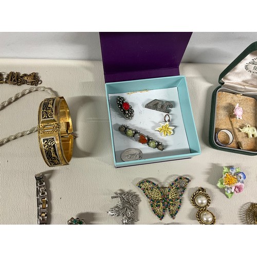 101A - 4 SMALL BOXES OF COSTUME JEWELLERY