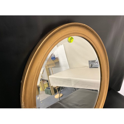 104 - EDWARDIAN GILT FRAMED OVAL WALL MIRROR A/F 23