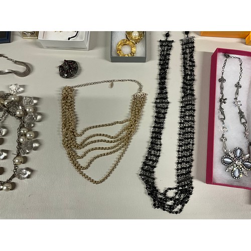 106 - 2 BOXES OF COSTUME JEWELLERY TO INCLUDE NECKLACES, WATCHES, BROOCHES, CUFFLINKS ETC