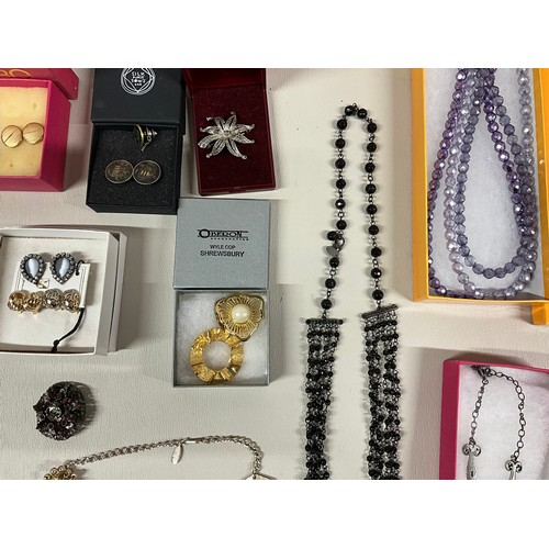 106 - 2 BOXES OF COSTUME JEWELLERY TO INCLUDE NECKLACES, WATCHES, BROOCHES, CUFFLINKS ETC