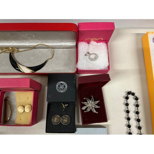 106 - 2 BOXES OF COSTUME JEWELLERY TO INCLUDE NECKLACES, WATCHES, BROOCHES, CUFFLINKS ETC
