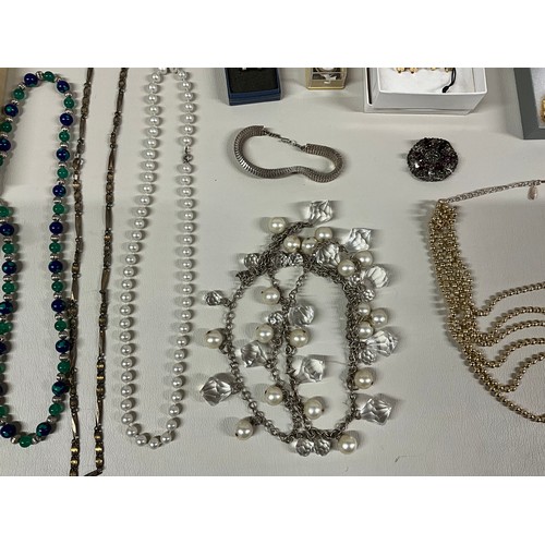 106 - 2 BOXES OF COSTUME JEWELLERY TO INCLUDE NECKLACES, WATCHES, BROOCHES, CUFFLINKS ETC