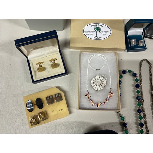 106 - 2 BOXES OF COSTUME JEWELLERY TO INCLUDE NECKLACES, WATCHES, BROOCHES, CUFFLINKS ETC