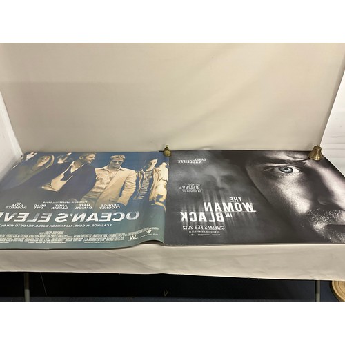 110 - 2 FILM POSTERS OCEANS ELEVEN AND WOMEN IN BLACK. ***BRASS NOT INCLUDED