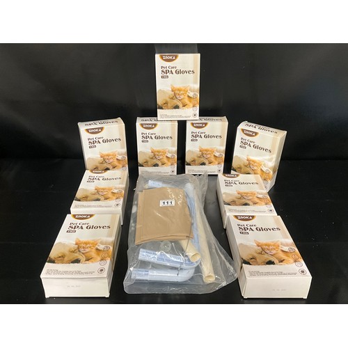 111 - QTY OF NEW 7 PIECE PET CARE GLOVES AND PET BED