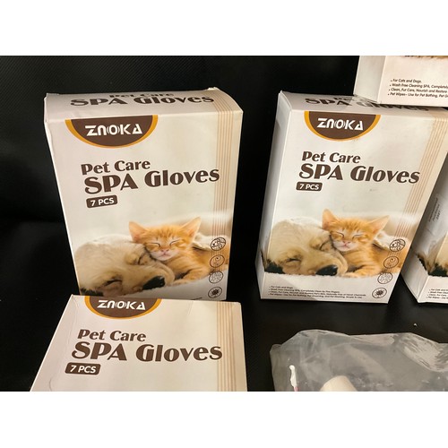 111 - QTY OF NEW 7 PIECE PET CARE GLOVES AND PET BED