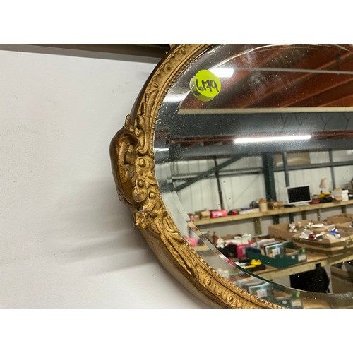 112 - VINTAGE GILT FRAMED BEVEL EDGE OVAL WALL MIRROR - FRAME A/F 21