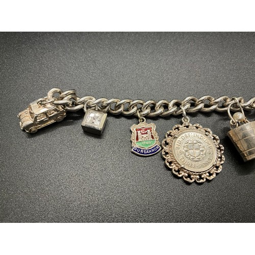 1 - HALLMARKED SILVER CHARM BRACELET WITH 16 SILVER & WHITE METAL CHARMS TW 58.9G LOCKET IS HALLMARK ENG... 