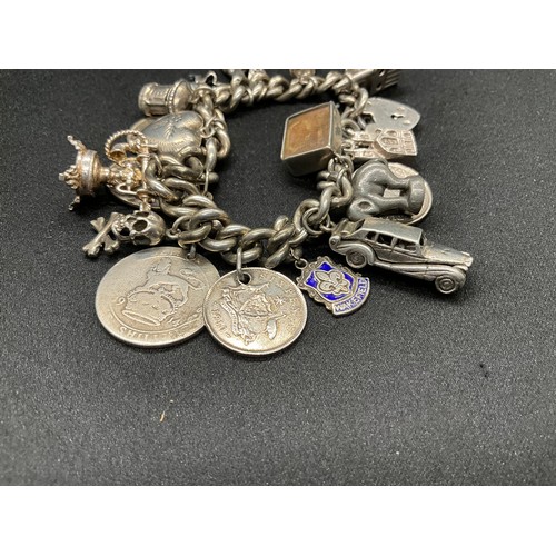 2 - HALLMARKED SILVER CHARM BRACELET WITH 20 CHARMS (1 COIN CHARM WHITE METAL) TW88.6G - HALLMARK SILVER... 