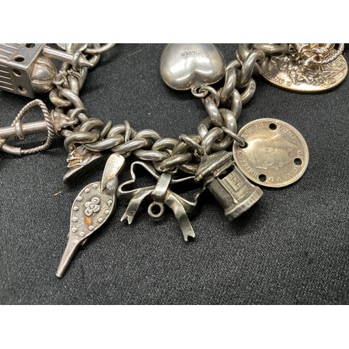 2 - HALLMARKED SILVER CHARM BRACELET WITH 20 CHARMS (1 COIN CHARM WHITE METAL) TW88.6G - HALLMARK SILVER... 