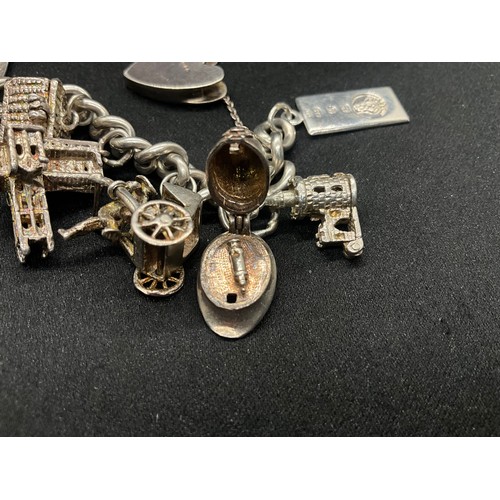 4 - HALLMARKED SILVER CHARM BRACELET WITH 22 CHARMS SILVER & WHITE METAL TW 85.8G - ENGLISH HALLMARK SIL... 