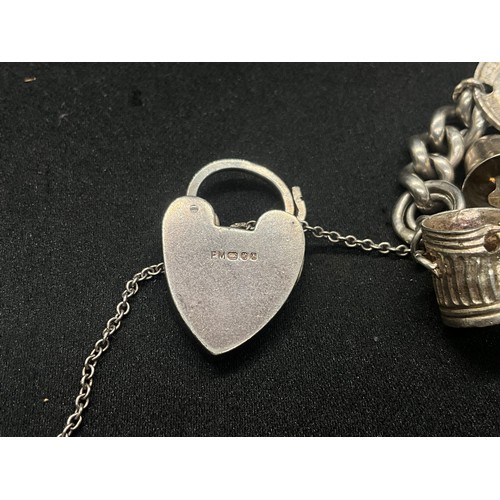 4 - HALLMARKED SILVER CHARM BRACELET WITH 22 CHARMS SILVER & WHITE METAL TW 85.8G - ENGLISH HALLMARK SIL... 