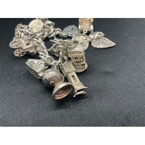 5 - HALLMARKED SILVER CHARM BRACELET WITH 14 SILVER & WHITE METAL CHARMS TW83G - LOCKET IS CONTINENTAL S... 