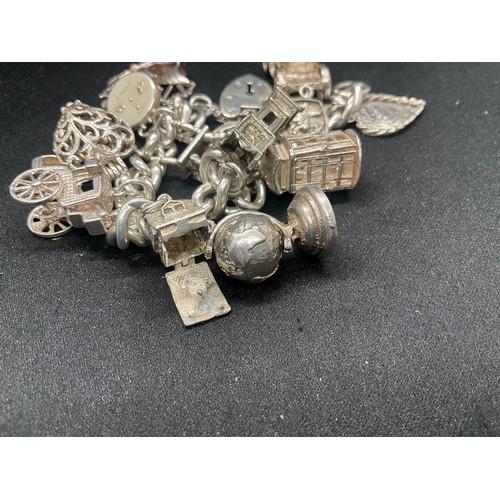 5 - HALLMARKED SILVER CHARM BRACELET WITH 14 SILVER & WHITE METAL CHARMS TW83G - LOCKET IS CONTINENTAL S... 