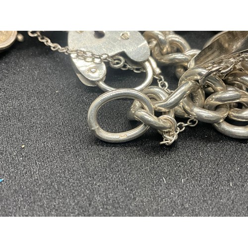 5 - HALLMARKED SILVER CHARM BRACELET WITH 14 SILVER & WHITE METAL CHARMS TW83G - LOCKET IS CONTINENTAL S... 