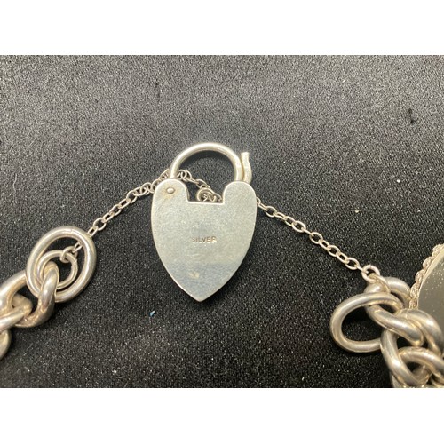 5 - HALLMARKED SILVER CHARM BRACELET WITH 14 SILVER & WHITE METAL CHARMS TW83G - LOCKET IS CONTINENTAL S... 