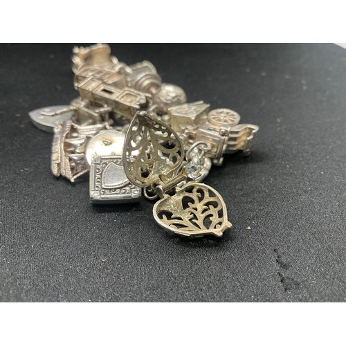 5 - HALLMARKED SILVER CHARM BRACELET WITH 14 SILVER & WHITE METAL CHARMS TW83G - LOCKET IS CONTINENTAL S... 