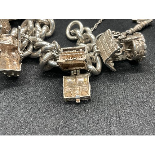 6 - HALLMARKED SILVER CHARM BRACELET WITH 9 SILVER & WHITE METAL CHARMS W68.6G - LOCKET IS ENGLISH HALLM... 