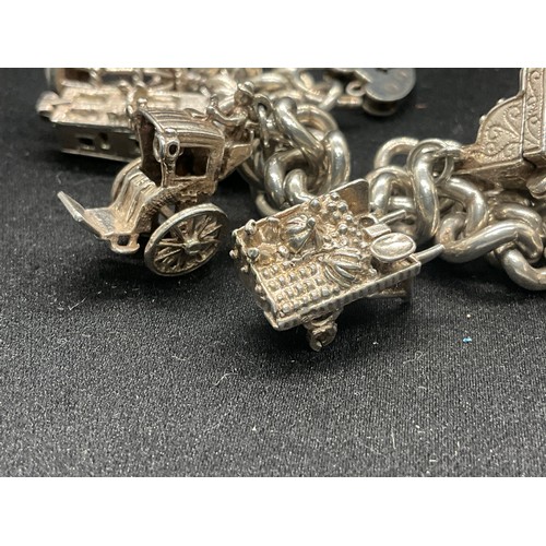 6 - HALLMARKED SILVER CHARM BRACELET WITH 9 SILVER & WHITE METAL CHARMS W68.6G - LOCKET IS ENGLISH HALLM... 