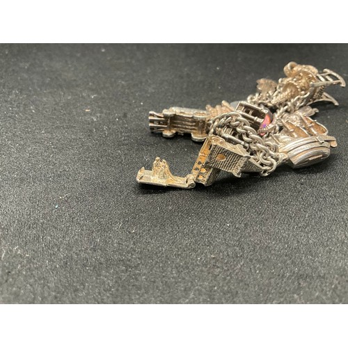 7 - SILVER CHARM BRACELET UNMARKED BUT TESTED WITH 13 SILVER CHARMS W50G - CONTINENTAL SILVER LOCKET,