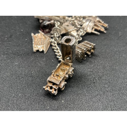 7 - SILVER CHARM BRACELET UNMARKED BUT TESTED WITH 13 SILVER CHARMS W50G - CONTINENTAL SILVER LOCKET,