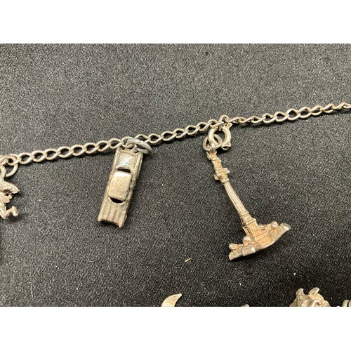 8 - 2 SILVER CHARM BRACELETS UNMARKED CHAIN BUT TESTED WITH A TOTAL OF 33 SILVER CHARMS W83.6G - 1 CHARM... 