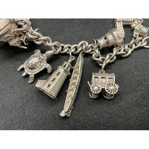 12 - ENGLISH HALLMARKED SILVER CHARM BRACELET WITH 15 SILVER CHARMS TW78.2G - LOCKET CONTINENTAL STAMPED ... 