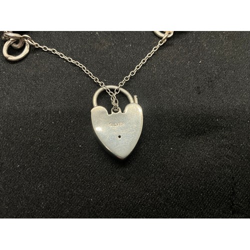 12 - ENGLISH HALLMARKED SILVER CHARM BRACELET WITH 15 SILVER CHARMS TW78.2G - LOCKET CONTINENTAL STAMPED ... 