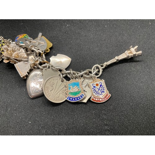 15 - HALLMARKED SILVER CHARM BRACLET WITH 37 SILVER CHARMS & 4 ADDITIONAL CHARMS NOT SILVER W76.1G