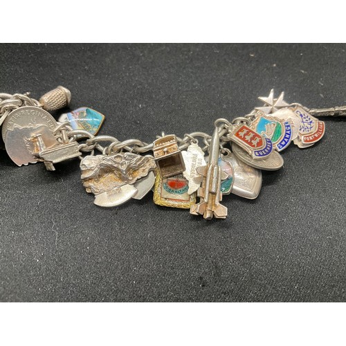 15 - HALLMARKED SILVER CHARM BRACLET WITH 37 SILVER CHARMS & 4 ADDITIONAL CHARMS NOT SILVER W76.1G
