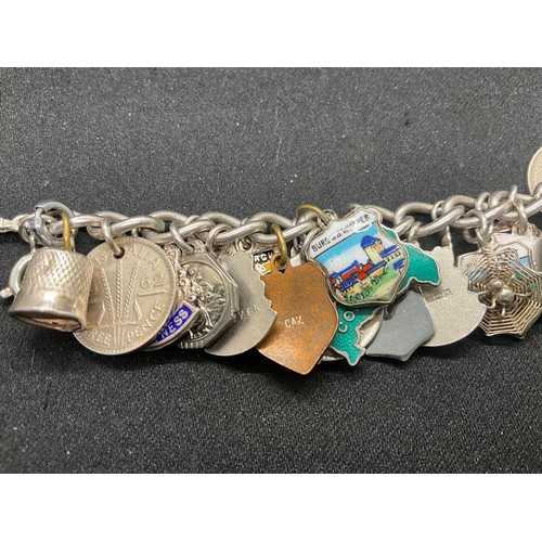 15 - HALLMARKED SILVER CHARM BRACLET WITH 37 SILVER CHARMS & 4 ADDITIONAL CHARMS NOT SILVER W76.1G
