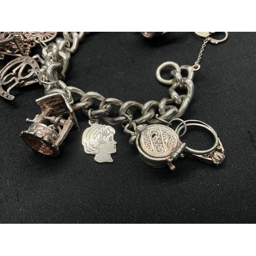 18 - HALLMARKED SILVER CHARM BRACELET WITH 11 SILVER CHARMS W68.3G - CHAIN & LOCKET ENGLISH HALLMARK
