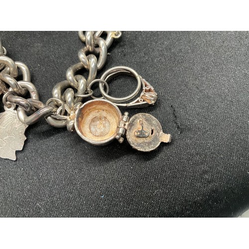 18 - HALLMARKED SILVER CHARM BRACELET WITH 11 SILVER CHARMS W68.3G - CHAIN & LOCKET ENGLISH HALLMARK