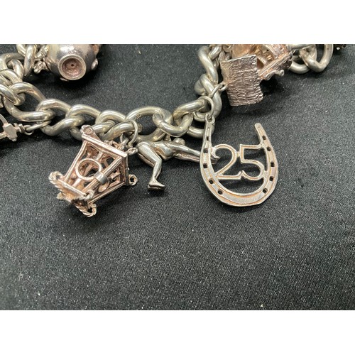 18 - HALLMARKED SILVER CHARM BRACELET WITH 11 SILVER CHARMS W68.3G - CHAIN & LOCKET ENGLISH HALLMARK