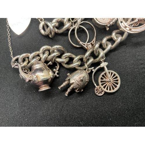18 - HALLMARKED SILVER CHARM BRACELET WITH 11 SILVER CHARMS W68.3G - CHAIN & LOCKET ENGLISH HALLMARK