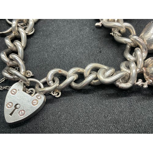 18 - HALLMARKED SILVER CHARM BRACELET WITH 11 SILVER CHARMS W68.3G - CHAIN & LOCKET ENGLISH HALLMARK
