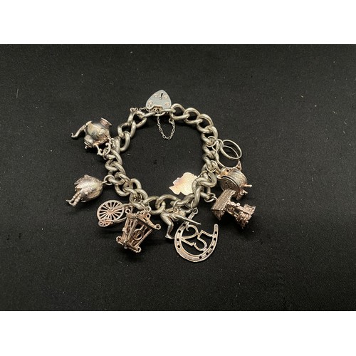 18 - HALLMARKED SILVER CHARM BRACELET WITH 11 SILVER CHARMS W68.3G - CHAIN & LOCKET ENGLISH HALLMARK