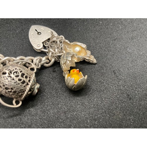 19 - SILVER CHARM BRACELET (TESTED) WITH 20 SILVER CHARMS W69.5G - ENGLISH HALLMARK LOCKET & CHAIN