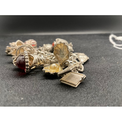19 - SILVER CHARM BRACELET (TESTED) WITH 20 SILVER CHARMS W69.5G - ENGLISH HALLMARK LOCKET & CHAIN