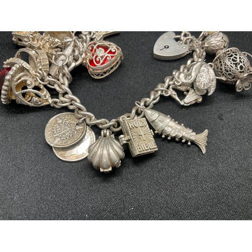 19 - SILVER CHARM BRACELET (TESTED) WITH 20 SILVER CHARMS W69.5G - ENGLISH HALLMARK LOCKET & CHAIN