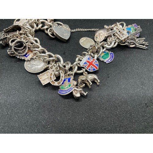 20 - HALLMARKED SILVER CHARM BRACELET WITH 28 SILVER CHARMS W71.9G WITH 3 ADDITIONAL NON SILVER CHARMS - ... 