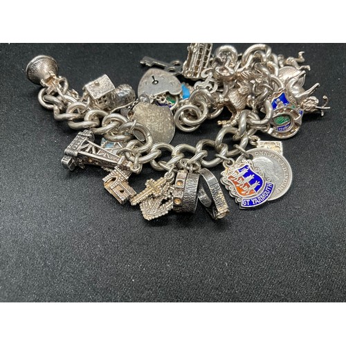20 - HALLMARKED SILVER CHARM BRACELET WITH 28 SILVER CHARMS W71.9G WITH 3 ADDITIONAL NON SILVER CHARMS - ... 