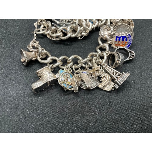 20 - HALLMARKED SILVER CHARM BRACELET WITH 28 SILVER CHARMS W71.9G WITH 3 ADDITIONAL NON SILVER CHARMS - ... 